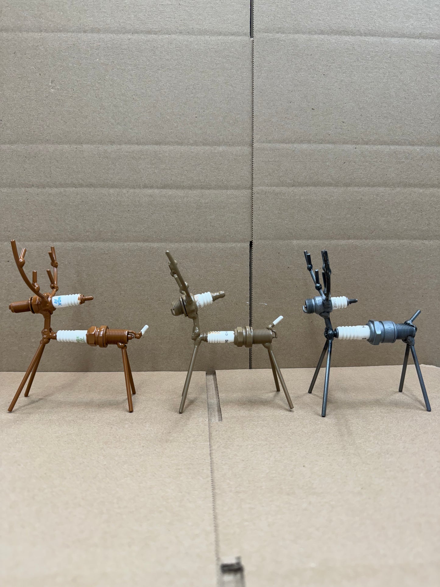 Recycled Metal Deer Spark Plugs